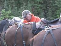 Bill Poser checking saddle (Small)